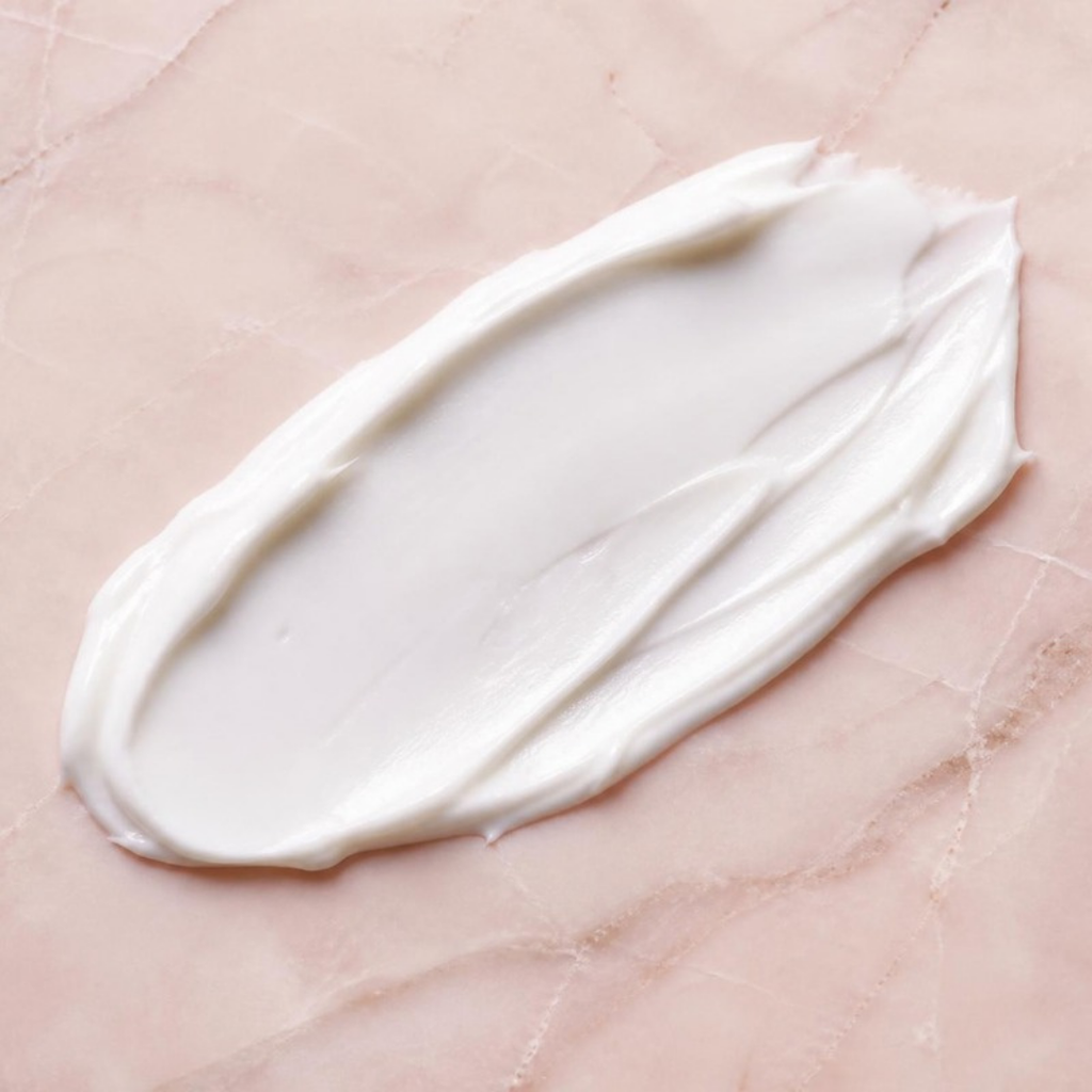 A swipe of Seoul Glow brightening cream showing its lightweight texture